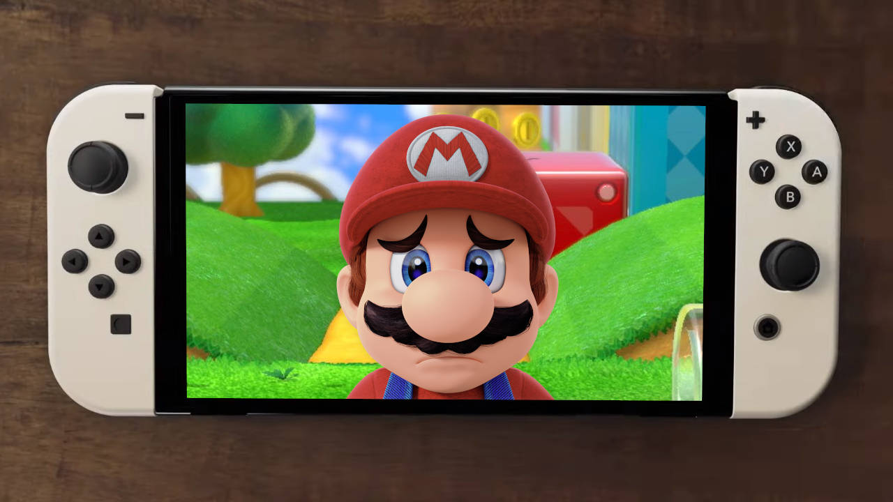 Nintendo Switch OLED - smutny Mario na ekranie konsoli