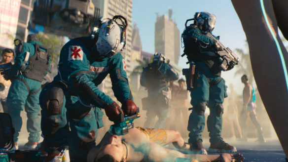 Cyberpunk 2077 - medycy reanimują mężczyznę na ulicy, wokół zebrała się masa gapiów