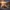 High-performance supercar drifting on mountain road at golden hour with motion blur