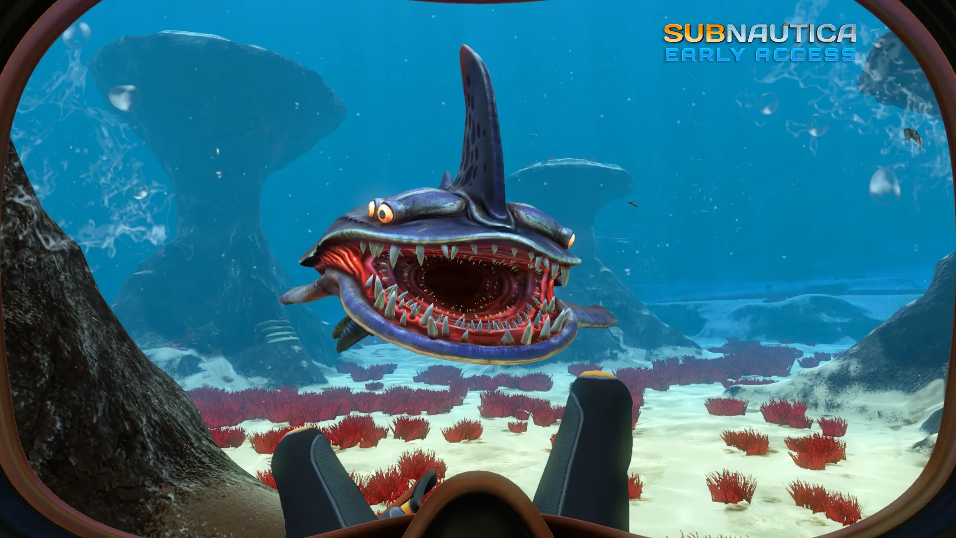 Menacing underwater creature from Subnautica 2 swimming near colorful coral.