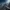 Futuristic soldier on alien planet holding sci-fi weapon with orbital structures in sky