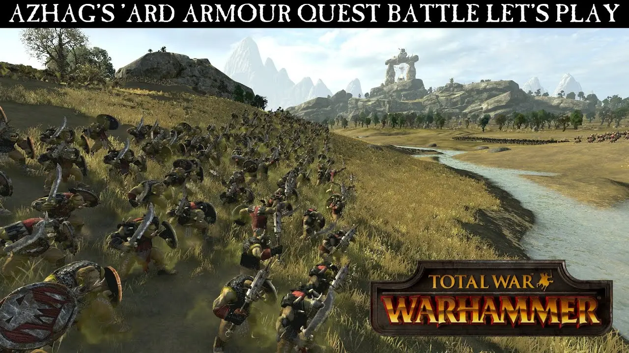 Orc units preparing for battle in Total War: Warhammer game environment.